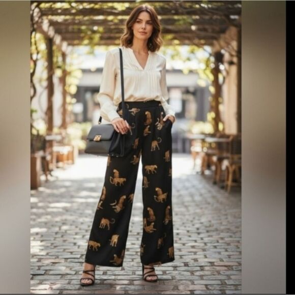Stylish black wide-leg pants. Features a bold leopard print. - Picture 2 of 15